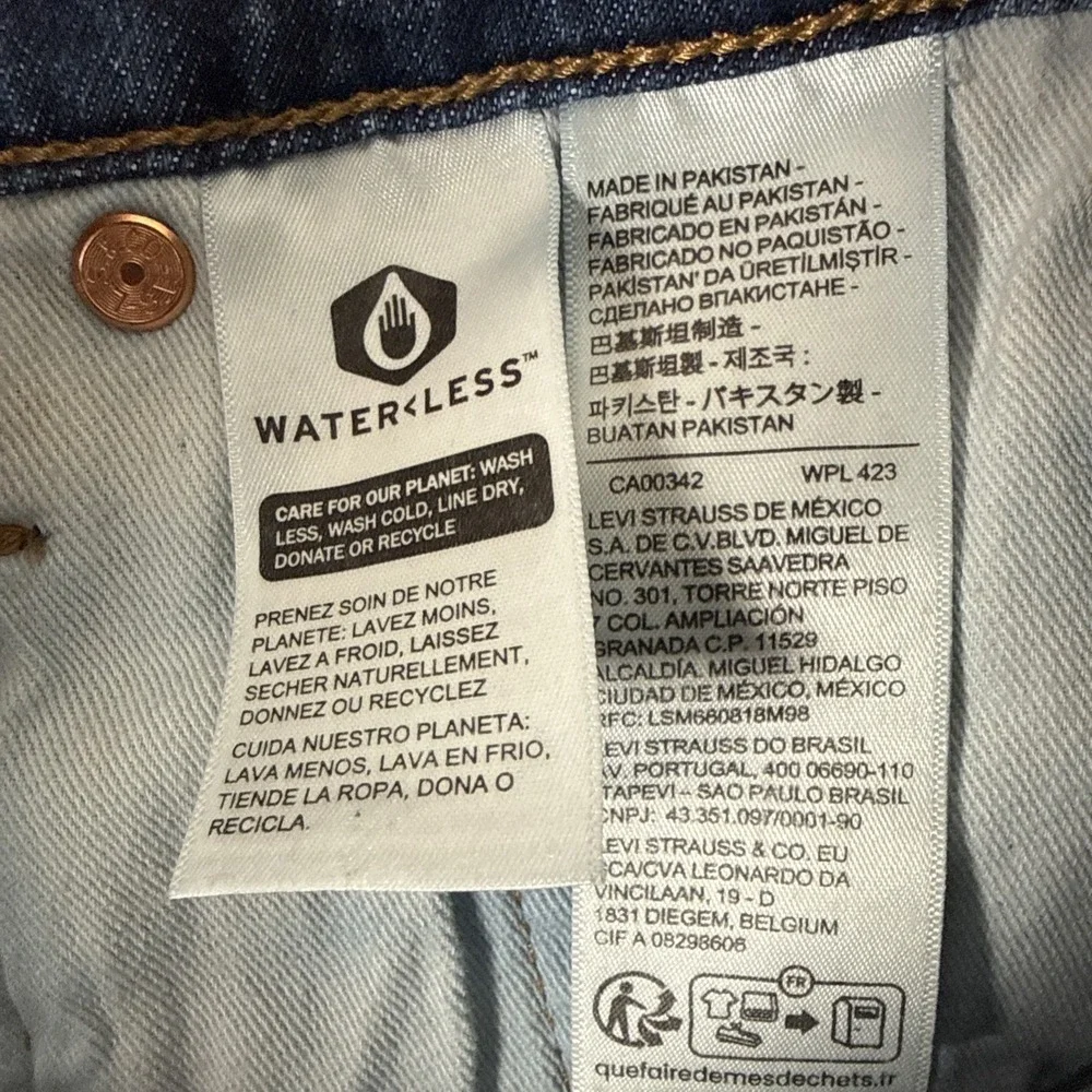 Levi's Slim Straight Dark Blue Jeans with Trans Pride Patch